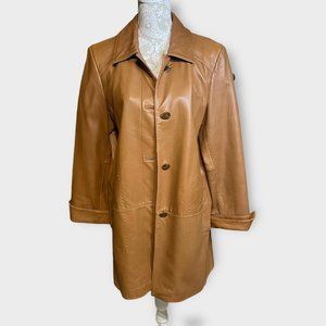 Vintage women’s leather jacket by LNR size large.